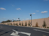 Screen wall that sits atop a retaining wall at Rocklin Crossings